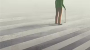 man walking on crosswalk 