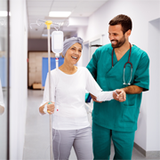 health care professional and woman with cancer