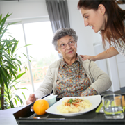 older woman and health professional